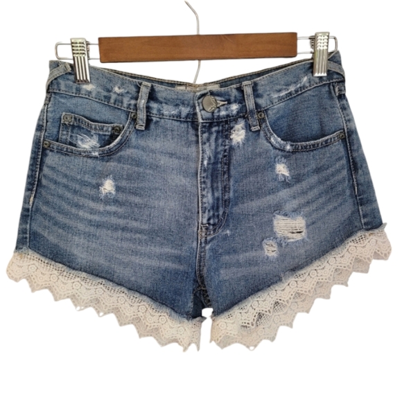 Free people | High-Waisted Medium Wash Jean Shorts with Distressing and Lace Hem - Picture 2 of 8